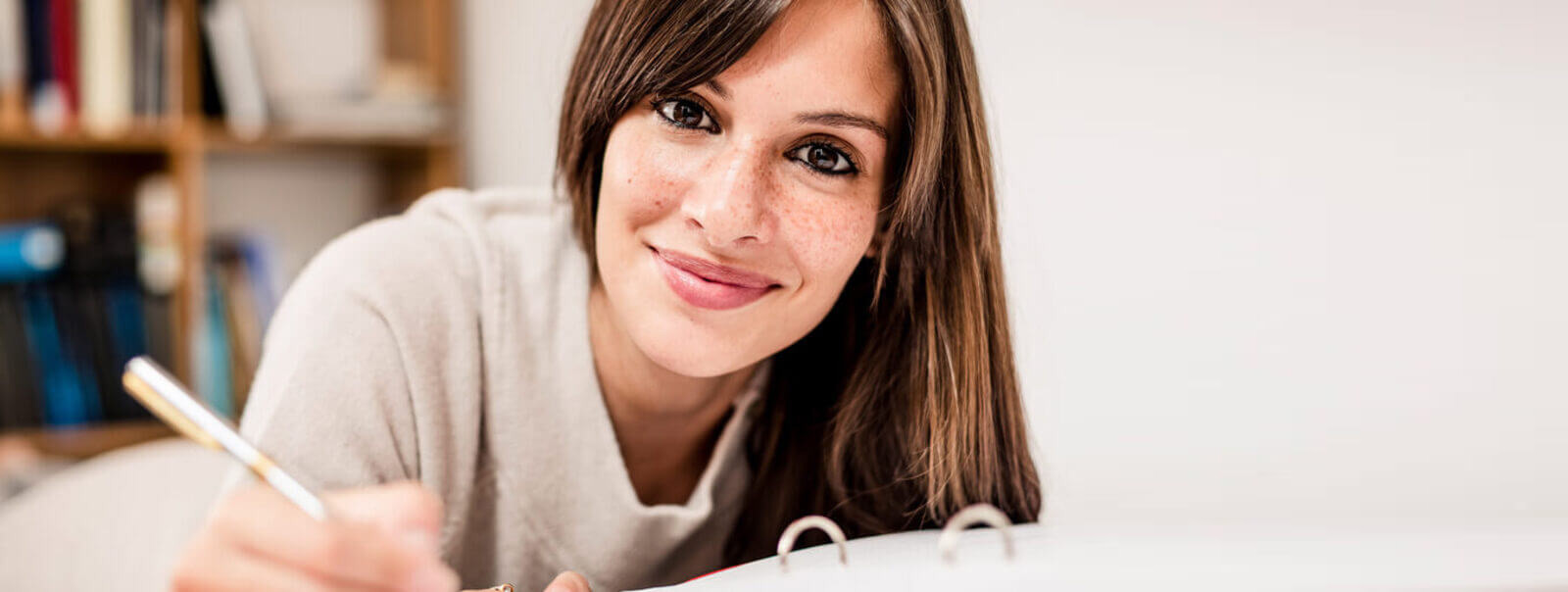attractive woman in work smiling at you